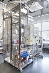 Monotube-Steam reformer fixed bed test stand for catalytic conversion of methane with steam, test stand housing, control station, and water desalination unit